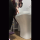 In this voyeuristic video, a heavily tattooed girl takes a shit while sitting on a toilet. Pooping sounds are clearly heard. Over 5 minutes.